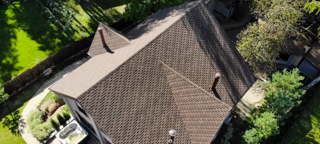 aerial view of new shingles on a residential home