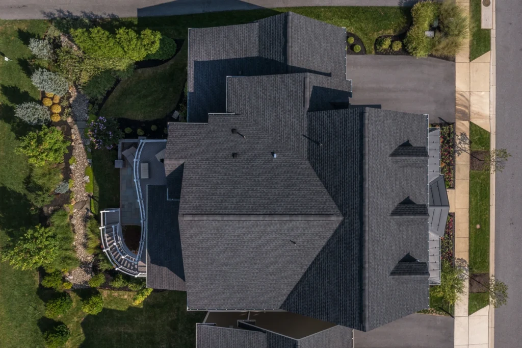 new installed shingle roof of residential house