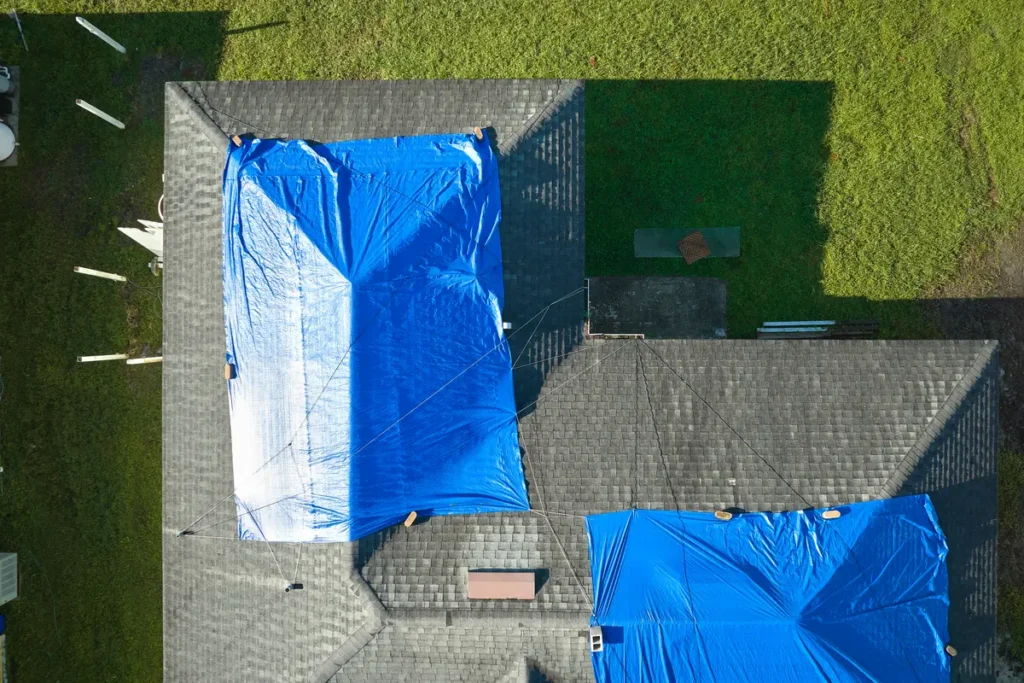 overhead view of a tarped roof