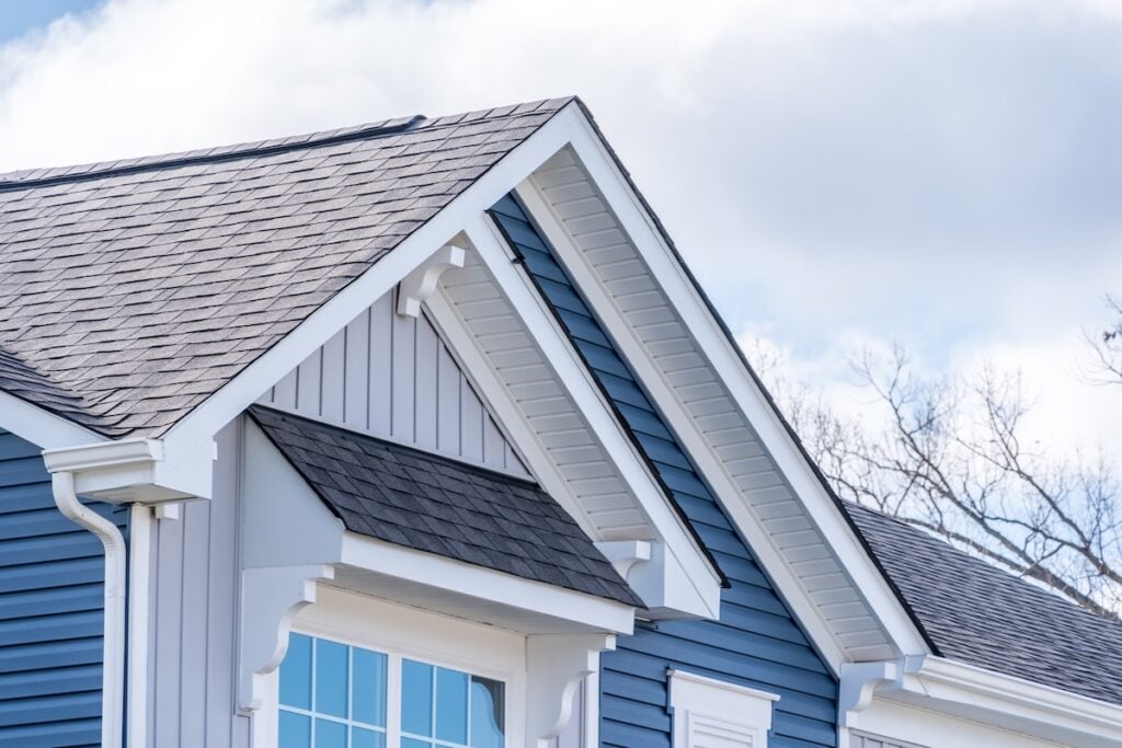 White fascia boards on blue house
