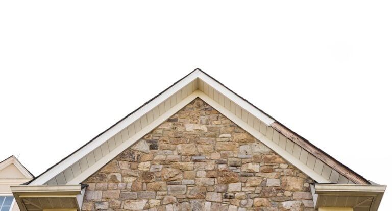 Roof line of house with white fascia